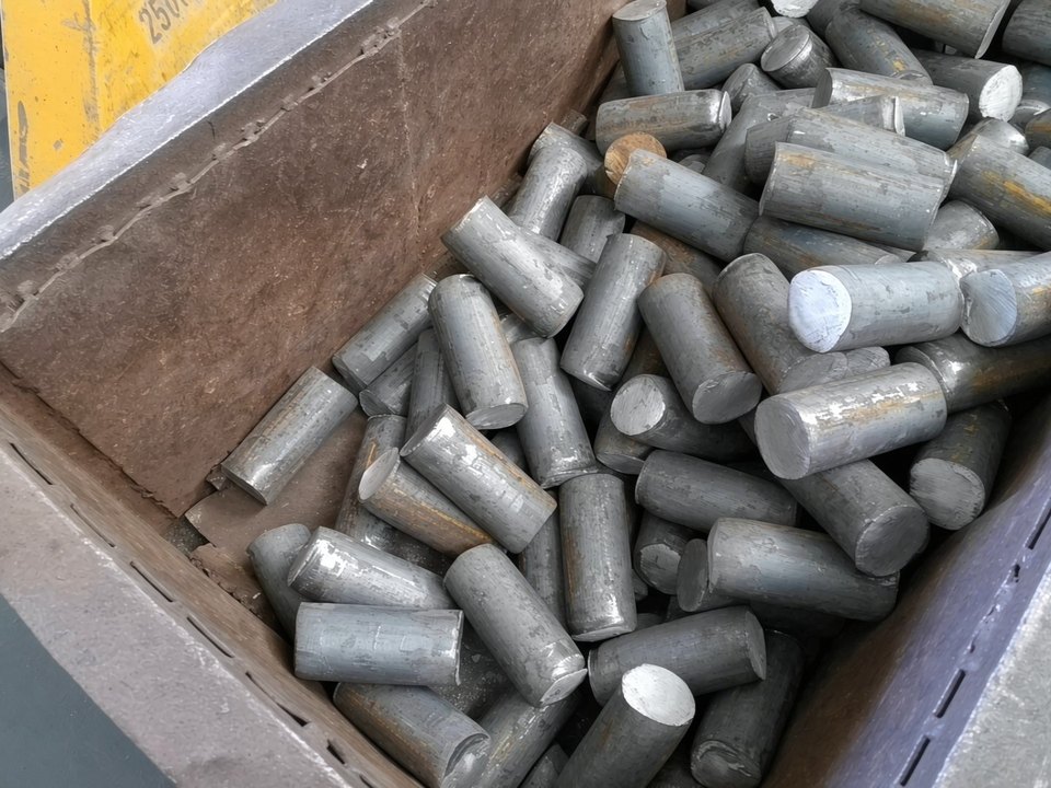 Cut bar stacked in a crate